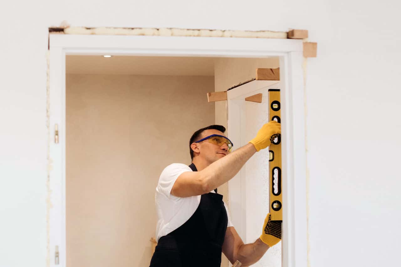 worker installing a door